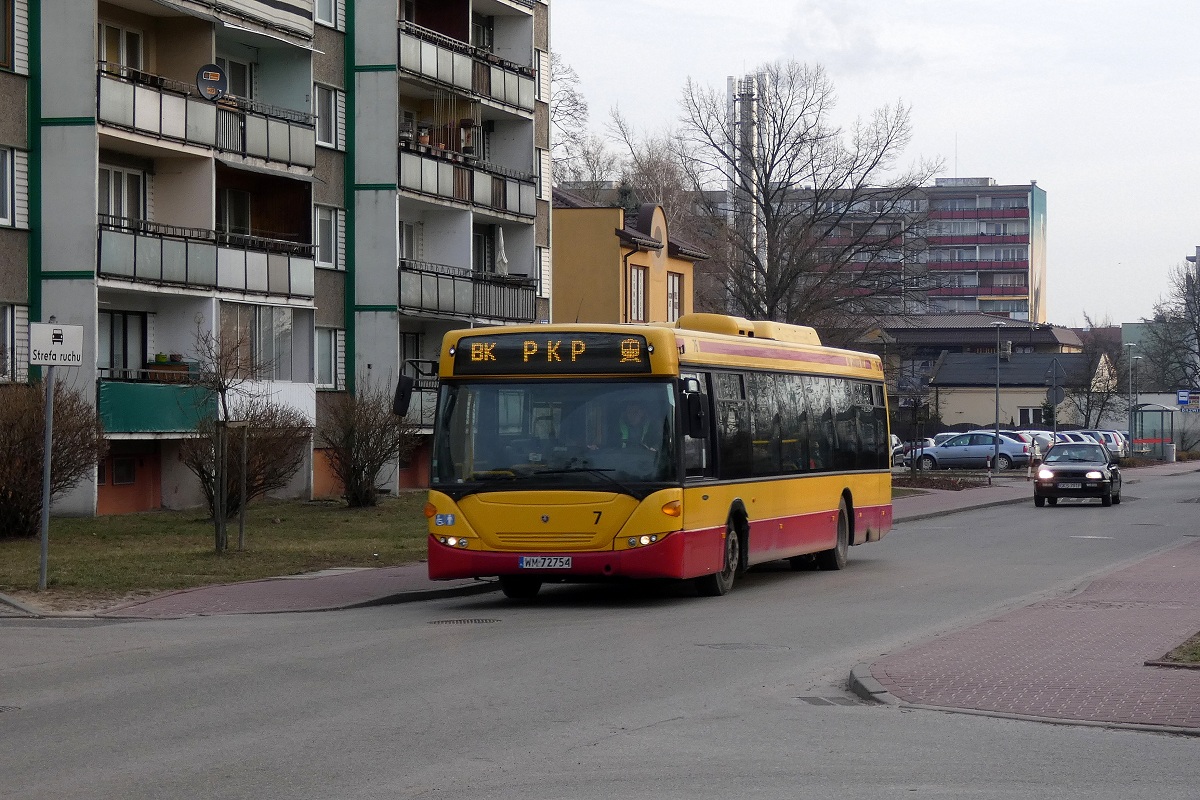 80287 
Scania (ex. 49676, ex. A587) jedzie w obsĹudze kursu â5451â linii przyspieszonej BK w relacji Grodzisk Maz. Dw. PKP (7:50)-Grodzisk Maz. Dw. PKP (8:08) p. Grodzisk Os. Teligi (7:59).

