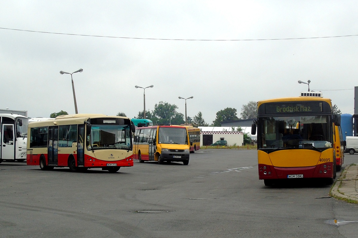 40001
Autosan SanCity #40001, VDL ProCity #50006 i Jelcz 120M #40105 stojÄ na terenie grodziskiej zajezdni PKS Grodzisk. 
