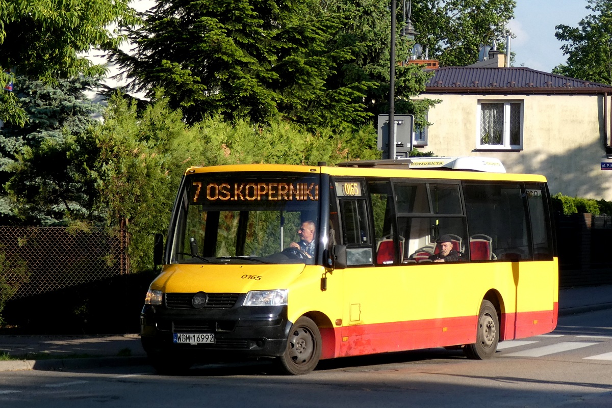 70014 (ex. 10165)
ProCity jedzie w obsĹudze kursu â26â linii numer 7 w relacji Grodzisk Maz. Szpital (17:55)-Grodzisk Maz. Szpital (18:29) p. Grodzisk Maz. Os. Teligi (18:13). 
Jest to jedyne ProCity PKS Grodzisk ktĂłre miaĹo szanse jeĹşdziÄ w podstawowej sieci WTP (linia 900). PatrzÄc na to Ĺźe podobny wyglÄd w postaci naniesienia nowszego schematu ZTM, klimatyzacji przestrzeni pasaĹźerskiej czy wymianie tapicerki na wzorki Warszawy uzyskaĹo jeszcze kilka ProCity (40007, 50009, 50022, 70013, 70019 - ostatnie dwa bez klimatyzacji przestrzeni pasaĹźerskiej) moĹźna siÄ domyĹliÄ Ĺźe PKS ostrzyĹ sobie zÄby na jakiĹ wiÄkszy kontrakt na nie w sieci WTP. SzczÄĹliwie (bÄdĹş nie) nie nadarzyĹa siÄ takowa okazja wiÄc typowo "warszawskie" ProCity jeĹźdĹźÄ na okolicznych kontraktach PKS Grodzisk. 
