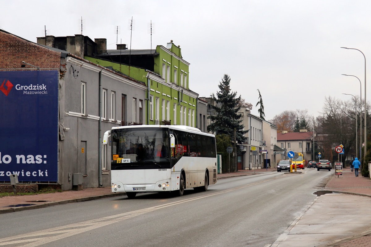 23047
Temsa jedzie z uczniami SP2 Grodzisk na zajÄcia WF na grodziskim basenie. W tle widoczny jest MAN TGE 5.180 / Mercus City #227 jadÄcy jako kurs 109 linii numer 32: JĂłzefina SzkoĹa (11:50)-Grodzisk Maz. Dw. PKP (12:50). 
