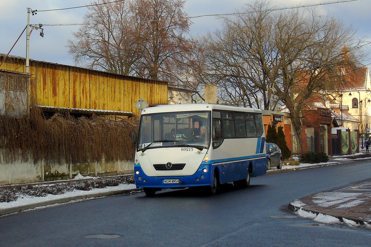 60215
Solina skrÄca w ul. KowalskÄ jadÄc w obsĹudze opĂłĹşnionego o ok. 10 minut kursu "5558" linii numer 3 w relacji Grodzisk Maz. Dw. PKP (14:10)-KĹudno Nowe PÄtla (14:46). 
Słowa kluczowe: DziwadĹo