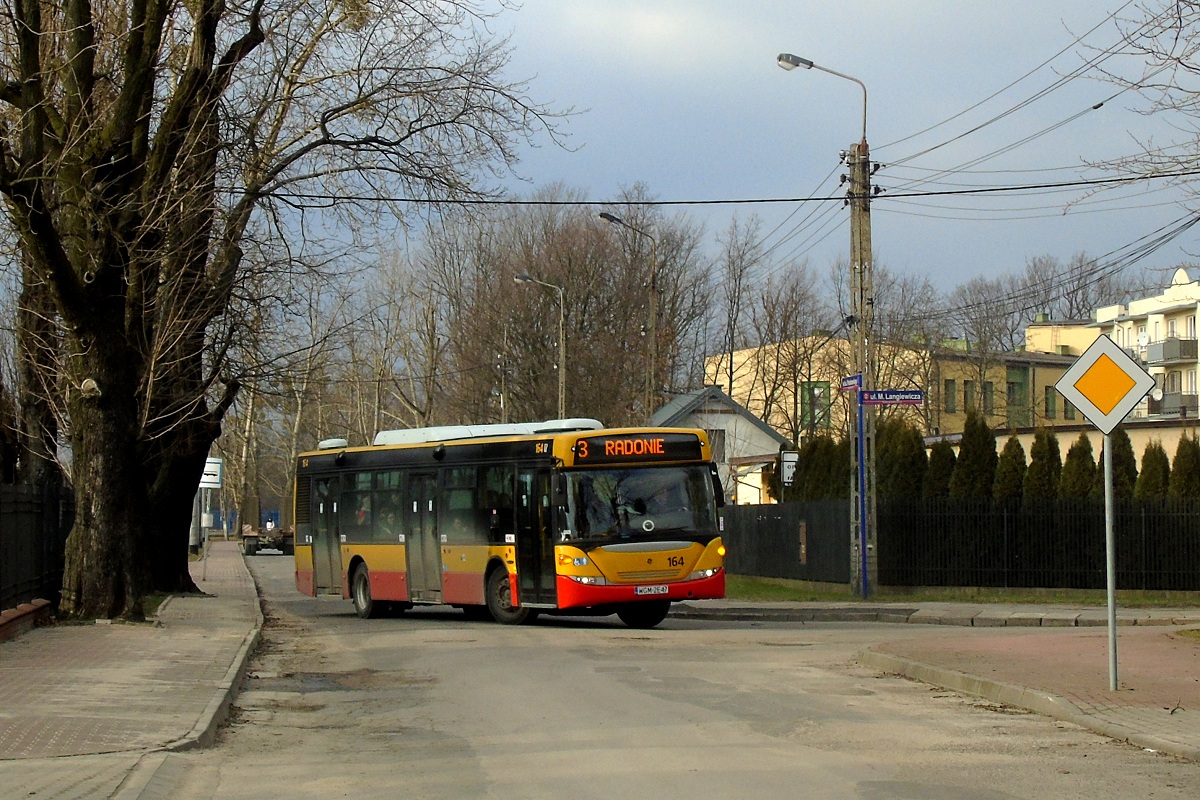 80308 
Scania (ex. 10164) skrÄca w ul. Langiewicza jadÄc w obsĹudze kursu "5523" linii numer 3 w relacji KĹudzienko PÄtla (14:11)-SzczÄsne Cmentarz Nowy (15:09). 
