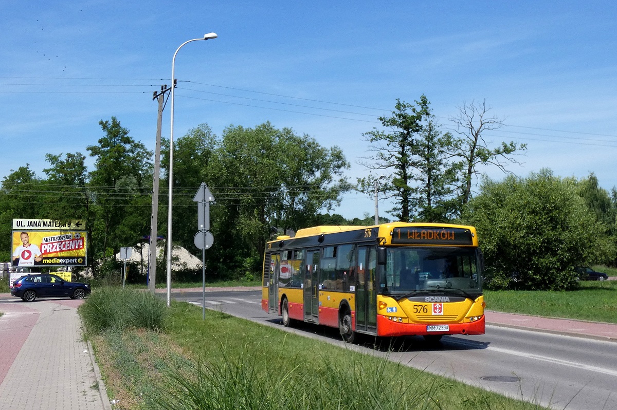 80276 
Scania (ex. A576) jedzie w obsĹudze kursu "5049" linii numer 1 w relacji Grodzisk Maz. Dw. PKP (12:53)-WĹadkĂłw PÄtla (13:30) p. Grodzisk Maz. Os. Teligi (13:01). Tym zdjÄciem chciaĹbym przywitaÄ wszystkich UĹźytkownikĂłw tej galerii. 
Słowa kluczowe: DziwadĹo