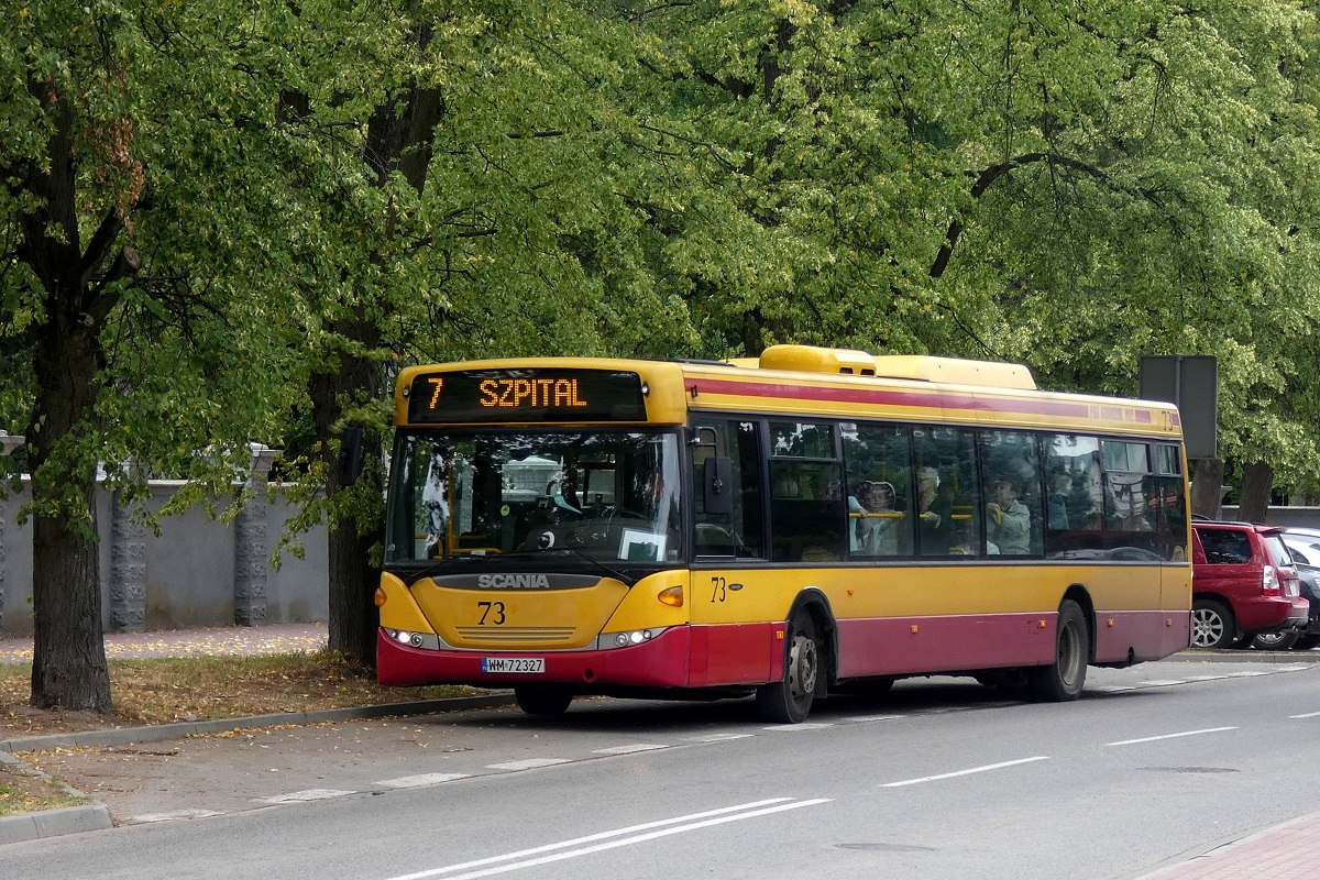 80273 
Scania (ex. A573)  zatrzymuje siÄ na przystanku "Grodzisk RadoĹska WKD 01" w obsĹudze kursu "4" linii numer 7 w relacji Grodzisk Maz. Szpital (9:00)-Grodzisk Maz. Szpital (9:38) p. Grodzisk Maz. Os. Teligi (9:19). 
