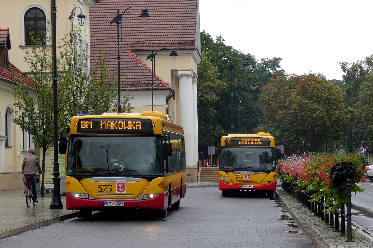 80275
Scania #80275 (ex. A575) stoi na pÄtli przy dworcu PKP gdzie zakoĹczyĹa obsĹugÄ kursu "5673" linii przyspieszonej BM w relacji MakĂłwka (6:45)-Grodzisk Maz. Dw. PKP (6:59). NastÄpnie pojedzie w obsĹudze kursu "5695" linii przyspieszonej BM w relacji Grodzisk Maz. Dw. PKP (7:03)-MakĂłwka (7:18). Obok stoi Scania #80276 (ex. A576) po zakoĹczeniu obsĹugi kursu "5064" linii numer 4 w relacji SzczÄsne Cmentarz Nowy (6:40)-Grodzisk Maz. Dw. PKP (6:50). NastÄpnie pojedzie w obsĹudze kursu "5068" linii numer 4 w relacji Grodzisk Maz. Dw. PKP (7:33)-Izdebno PÄtla (7:50). 
