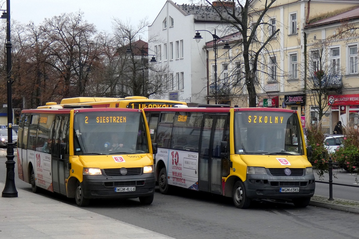 50013
ProCity #50013 stoi w obsĹudze kursu â5114â linii numer 1 w relacji MakĂłwka (9:45)-SiestrzeĹ (10:30). Obok stoi ProCity #30024 po zakoĹczeniu obsĹugi kursu â5283â linii numer 8 w relacji MakĂłwka (8:30)-Grodzisk Maz. Dw. PKP (9:10). NastÄpnie pojedzie w obsĹudze kursu â5278â linii numer 8 w relacji Grodzisk Maz. Dw. PKP (10:20)-MakĂłwka (10:49). Za nim stoi Scania CN270 UB 4x2 EB #80273 (ex. A573) po zakoĹczeniu obsĹugi kursu â5147â linii numer 2 w relacji KsiÄĹźenice PÄtla (8:50)-Grodzisk Maz. Dw. PKP (9:15). NastÄpnie pojedzie w obsĹudze kursu â5007â linii numer 1 w relacji Grodzisk Maz. Dw. PKP (10:05)-WĹadkĂłw PÄtla (10:22). 
